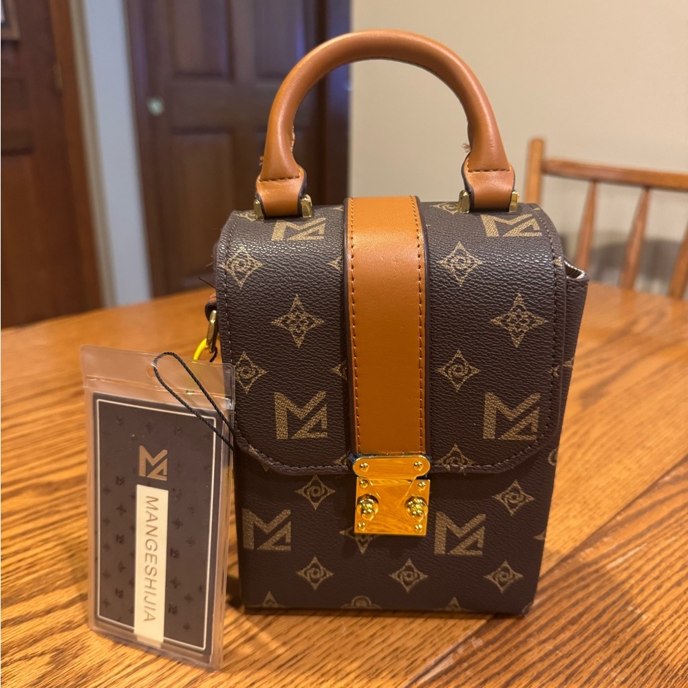 Woman's NWT Brown Crossbody Bag with leather strap. Have 2 of these